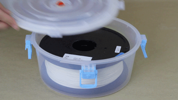 Vacuum sealed filament container